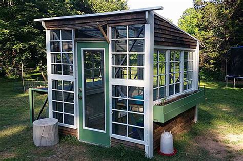 green house out if metal windows|old window greenhouses.